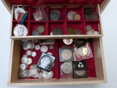 A collection of interesting coins and commemoratives to include nineteenth century silver