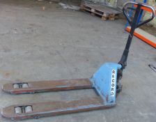 A pallet/ pump truck.