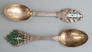 Two Danish white metal and enamel spoons, one 1930 maker Christian F Heise the other 1932 maker