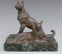 Pair of cast metal dogs on marble base, height 16cm