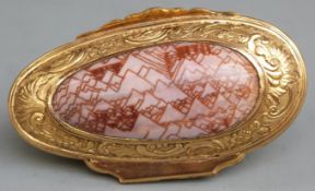 18th century gilt metal mounted conus textile shell snuff box with floral and swag decoration,