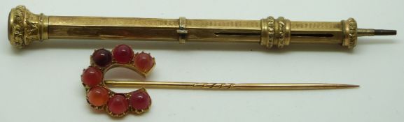Victorian stick pin set with agate in the form of a horseshoe and a Victorian pencil