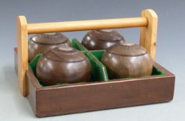A set of presentation lignum vitae bowls with engraved silver insets dated 1925, in carry case