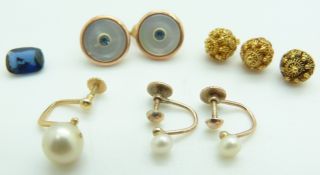 A pair of 9ct gold earrings set with a pearl to each, filigree buttons, etc