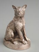 Hallmarked silver novelty model of a seated dog, Sheffield 1987 maker's mark HL, height 9.5cm