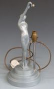 Art Deco figural lamp formed as a lady holding a glass disc, height 41cm