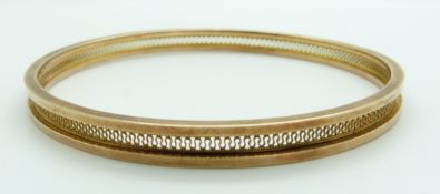 A 9ct gold flapper bangle, Chester 1911, 10.1g