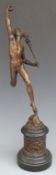 A bronze figure of Mercury, the base with relief moulded bronze frieze of cherubs dancing, height