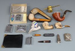 Meerschaum figural pipe with white metal mount, further pipe with hallmarked silver mount, cased