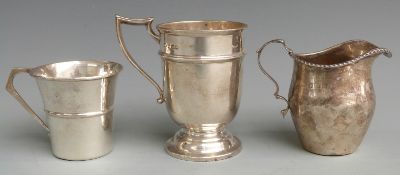 Two hallmarked silver mugs and a hallmarked silver jug, height of tallest 9.5cm, weight of all three