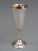 White metal miniature goblet or champagne flute, marked international sterling to base, height