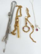 A collection of costume jewellery including purple pearl necklace, 9ct gold chain, ceramic bead