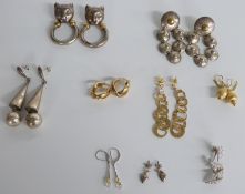 Three pairs of silver gilt earrings including, pair silver earrings set with cubic zirconia, and a