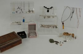 A collection of silver jewellery including pendants, bracelets, earrings, glass beads, etc