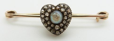 Victorian brooch set with a central pearl surrounded by rose cut diamonds, 3.2g (4.3cm long)