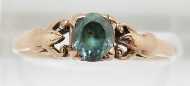A 9ct gold ring set with an oval cut zircon, 1.3g