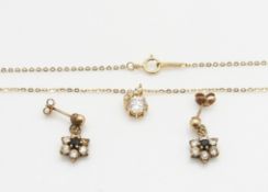 A 9ct gold necklace set with cubic zirconia and a pair of 9ct gold earrings, 2.6g