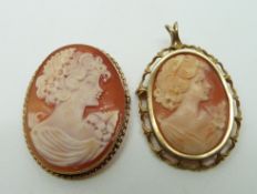 Two 9ct gold pendants/ brooches each set with cameos