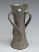 Tudric Pewter Arts and Crafts waisted vase with wrythen handles and turquoise colored cabochons,