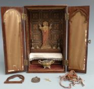 Edwardian oak-cased travelling reliquary, height 21cm and various St. Christophers