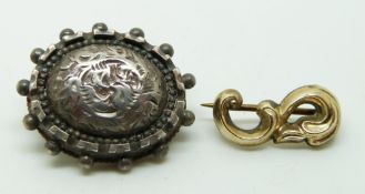 Victorian silver brooch and a Victorian yellow metal 