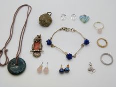 A carved lapis lazuli bracelet, glass pendant, agate necklace, 9ct gold ring set with diamonds (1.