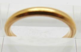 A 22ct gold wedding band, Birmingham 1926, 3.4g, size L