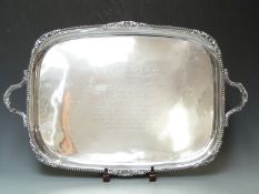 Large hallmarked silver twin handled tray with gadrooned edge, engraved 'presented to Anders