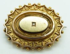 Victorian Etruscan Revival gold brooch set with a seed pearl, 5.4g, 2.5 x 3.4cm