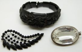 Victorian carved jet bracelet, a French jet brooch and a large quartz pendant