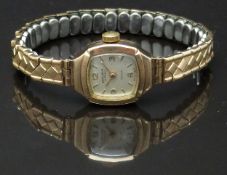 Excalibur 9ct gold ladies wristwatch with gold hands and hour markers, silver dial and 17 jewel