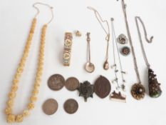 A collection of costume jewellery including enamel brooch, silver spoon, rolled gold necklace,