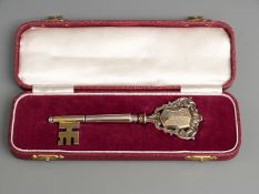 Cased hallmarked silver gilt commemorative key, dated 1972 to commemorate the opening of Cartref