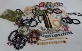 A collection of costume jewellery including pearl bracelet, beads,etc