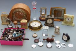 A collection of clocks, watches and parts for the restorer