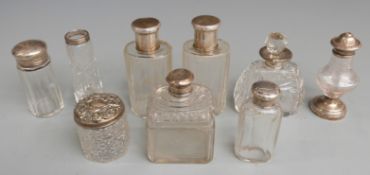 Five hallmarked silver mounted items including dressing table bottles, salt and vase together with