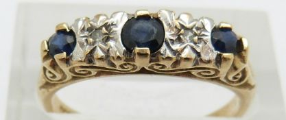 A 9ct gold ring set with three sapphires and diamonds, 2.6g, size O