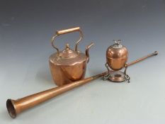 A coaching horn, copper teapot and copper burner/egg codler