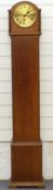 An oak cased granddaughter clock with three train movement and with bobbin turned decoration, the