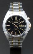 Seiko Kinetic gentleman's automatic wristwatch ref. 5M63-0AH0 with day and date aperture, luminous