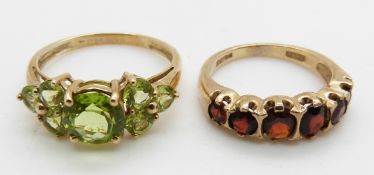 Two 9ct gold rings, one set with garnets and the other peridot, 6.4g
