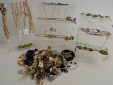 A collection of costume jewellery including 1930's faux pearl necklace, paste necklaces, 1950s