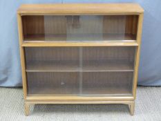 Gordon Russell or similar light oak bookcase with glazed sliding doors, W93 x D24 x H95cm