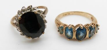 A 9ct gold ring set with a sapphire and diamonds and a 9ct gold ring set with blue topaz, 6.8g