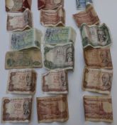 An amateur collection of UK and overseas coinage and banknotes, cased medal coins etc