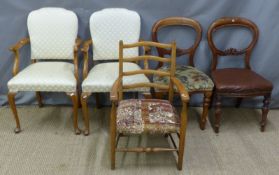 Two cream upholstered armchairs and three various further chairs