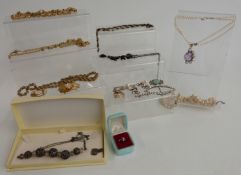 A collection of costume jewellery including Grosse brooch, necklaces, paste jewellery etc