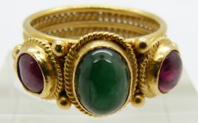Ilias Lalaounis 18ct gold ring set with an emerald cabochon and two ruby cabochons, originally