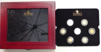 Sovereign 'Era of Gold - Age of Empire' collection, comprising seven gold full sovereigns in a glass