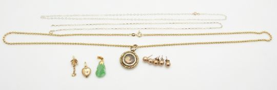 An 18ct gold necklace made up of spherical links (12.3g), 14k pendant (0.8g), 9ct gold heart and